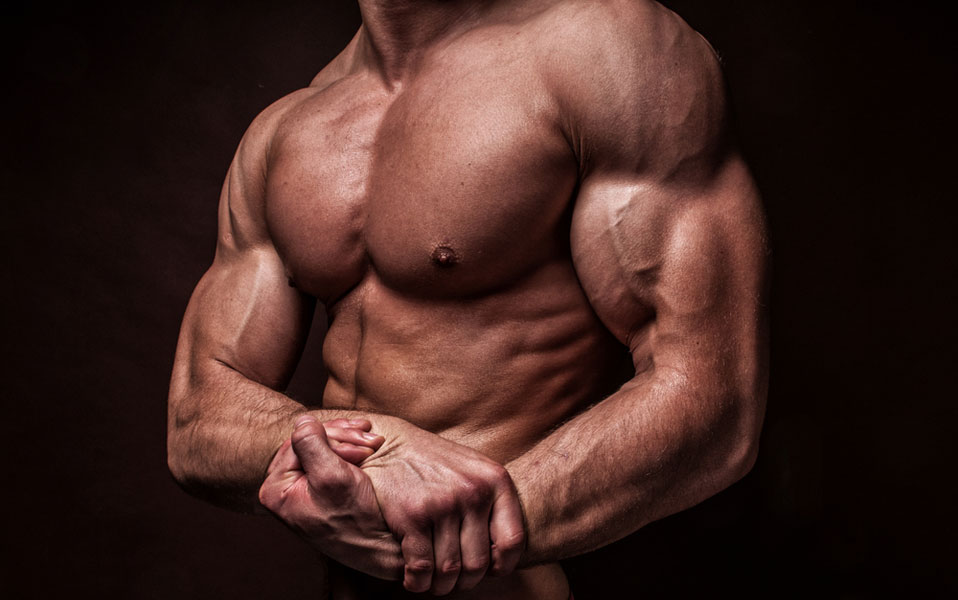 Muscular Man flexing biceps.